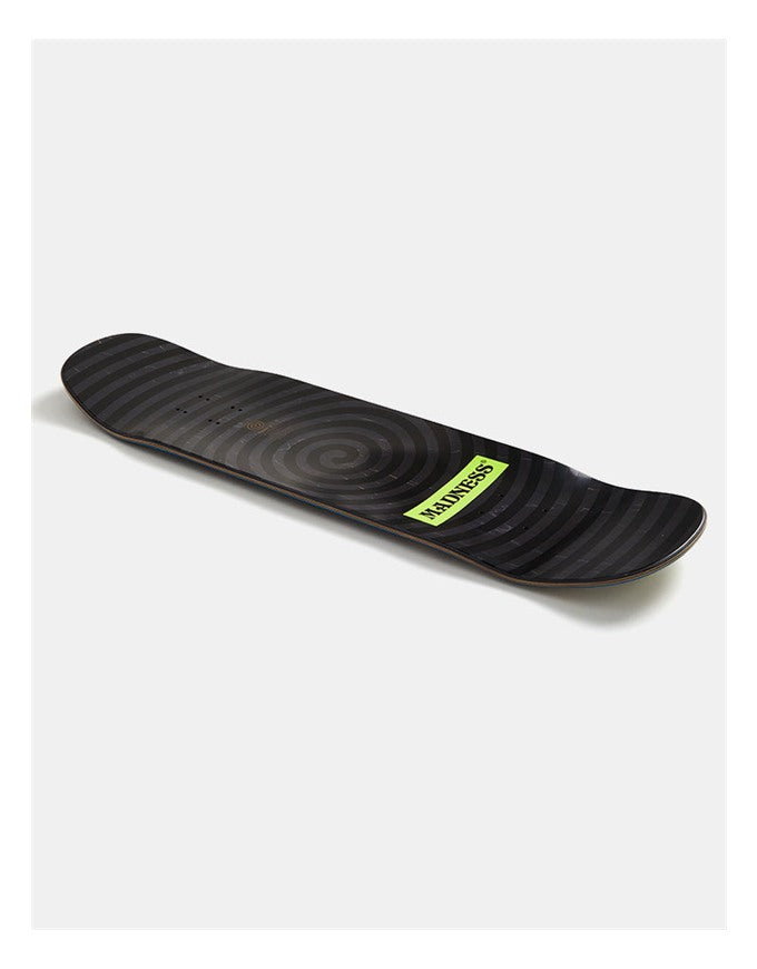 A black skateboard deck with a subtle spiral pattern and a bright yellow-green 'Majestic' logo sticker, shown on a light gray background.